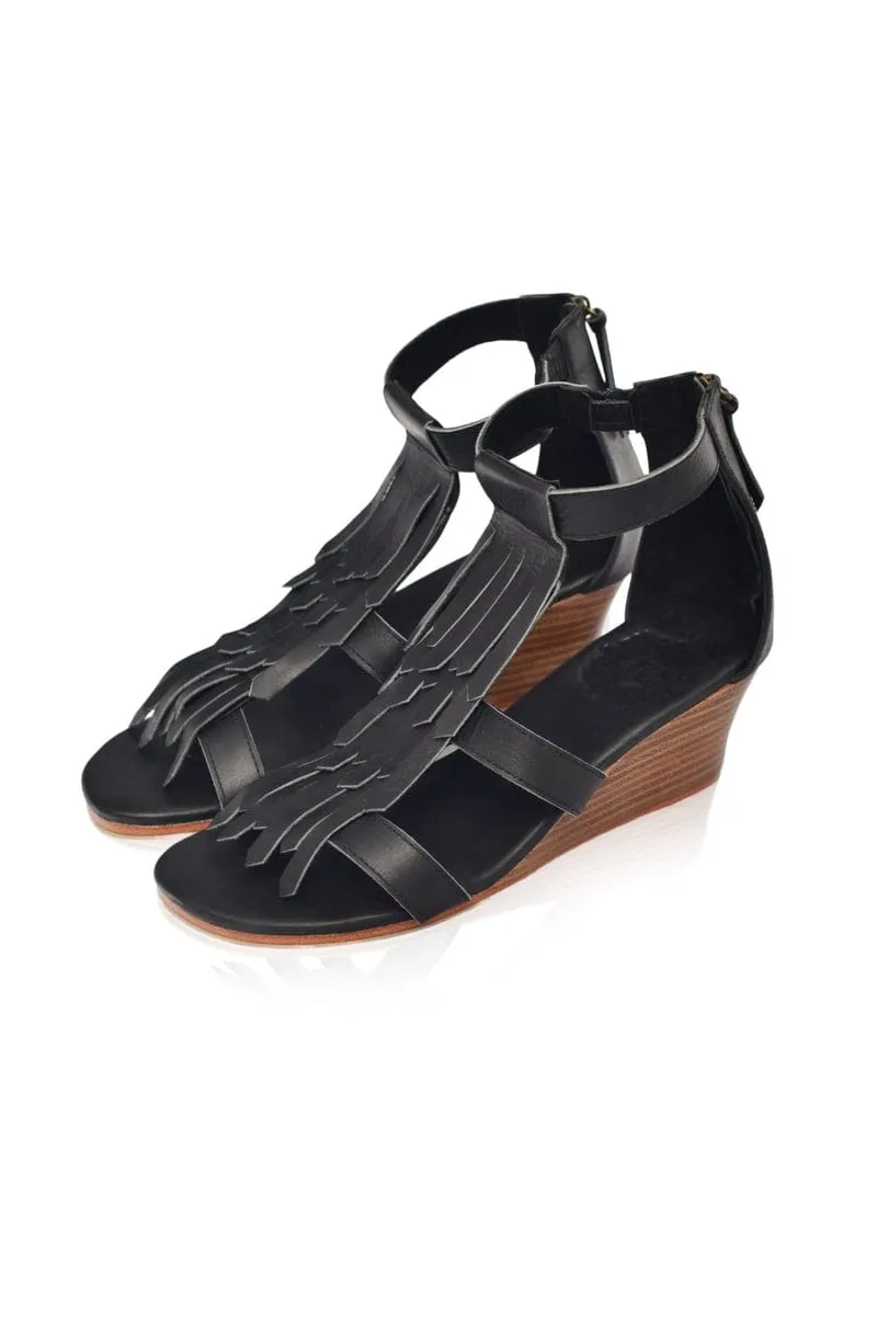 Fly Away Fringe Sandals in Black